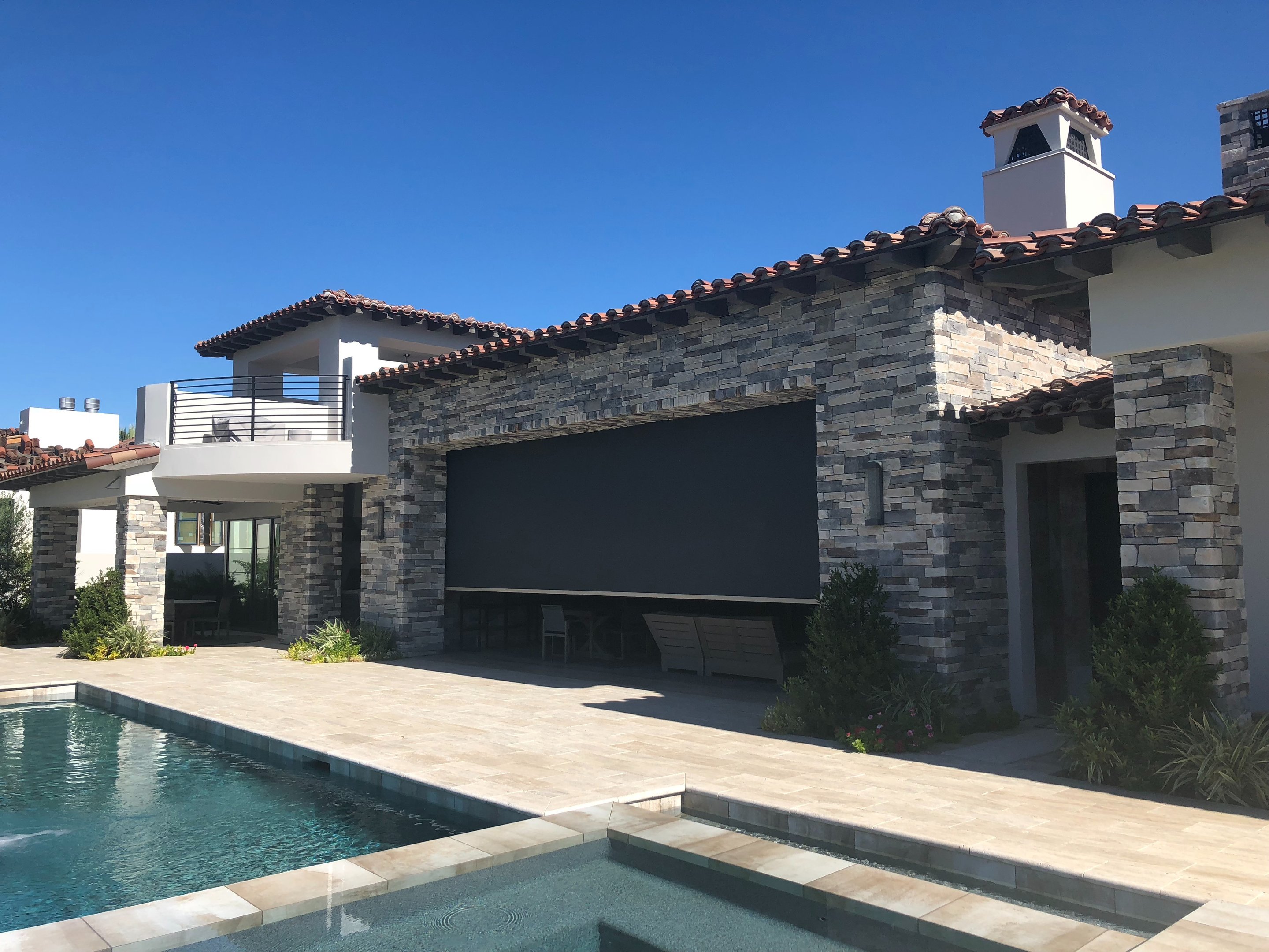 Motorized hurricane screen installation on a Southwest Florida home
